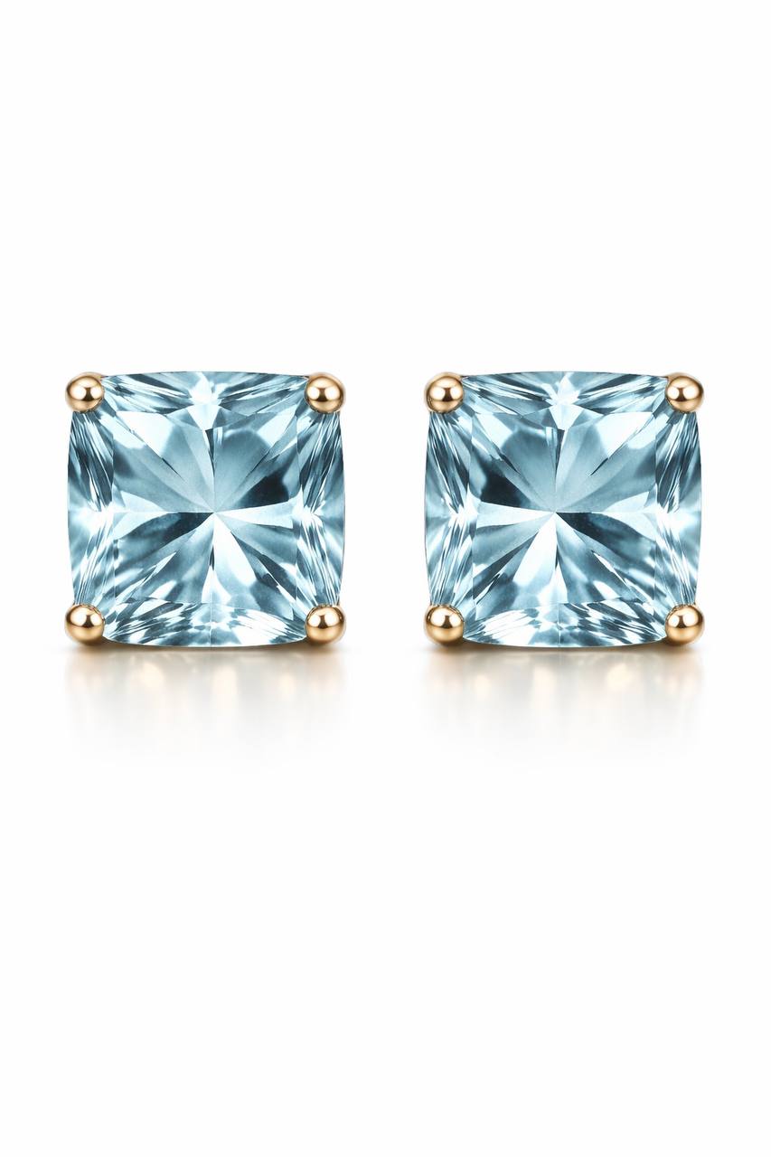 AÏNE Blue Topaz Studs in Yellow Gold