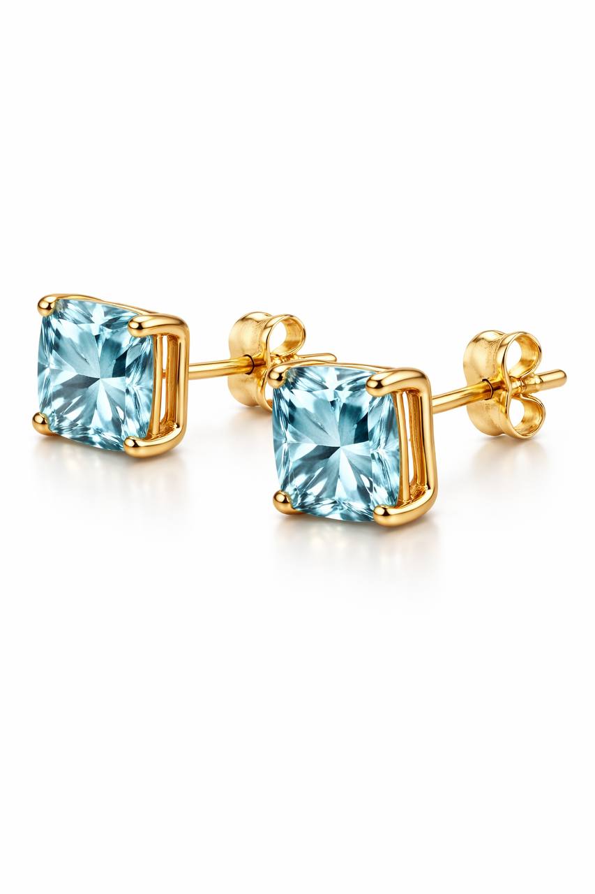 AÏNE Blue Topaz Studs in Yellow Gold