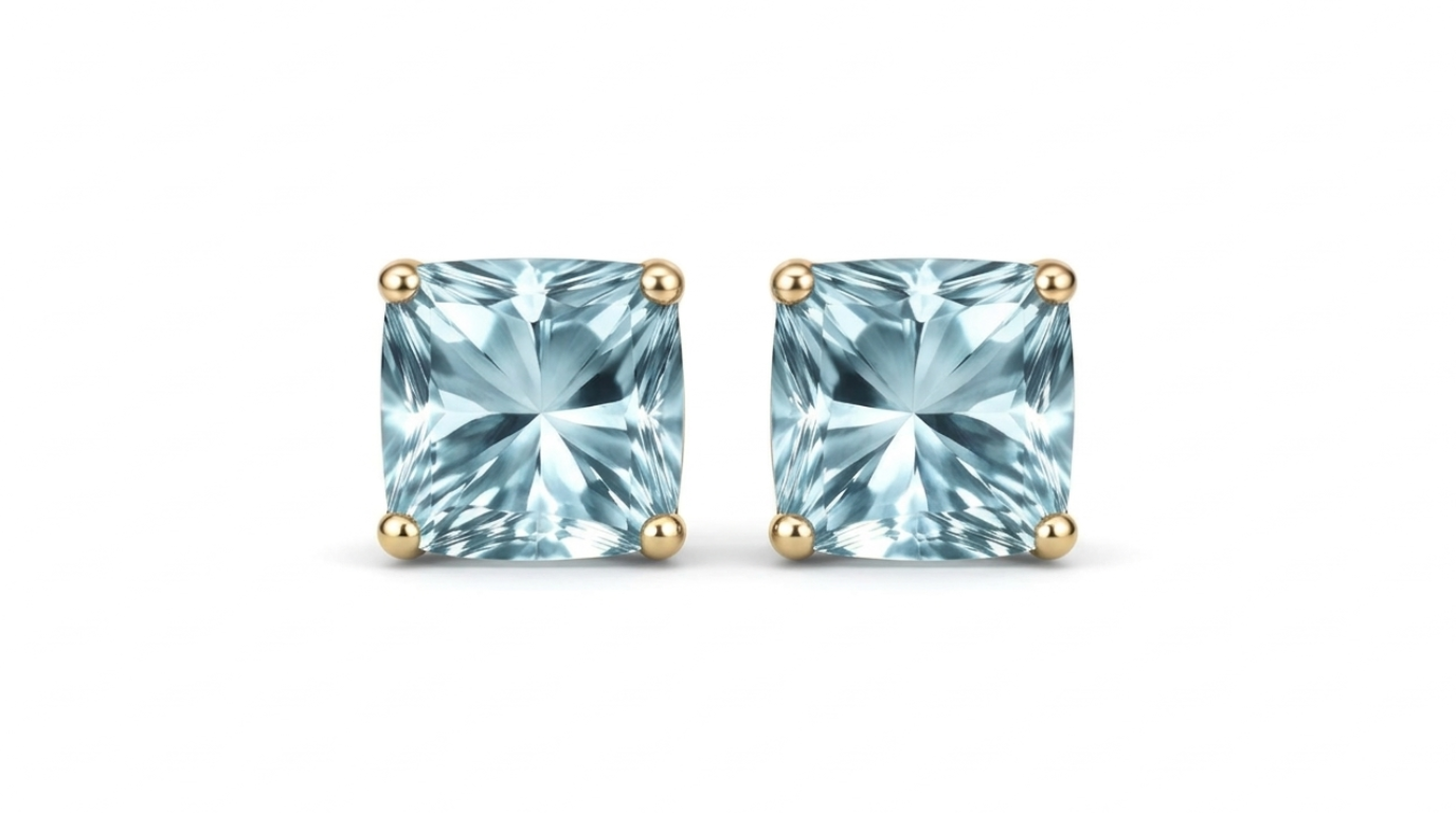 AÏNE Blue Topaz Studs in Yellow Gold