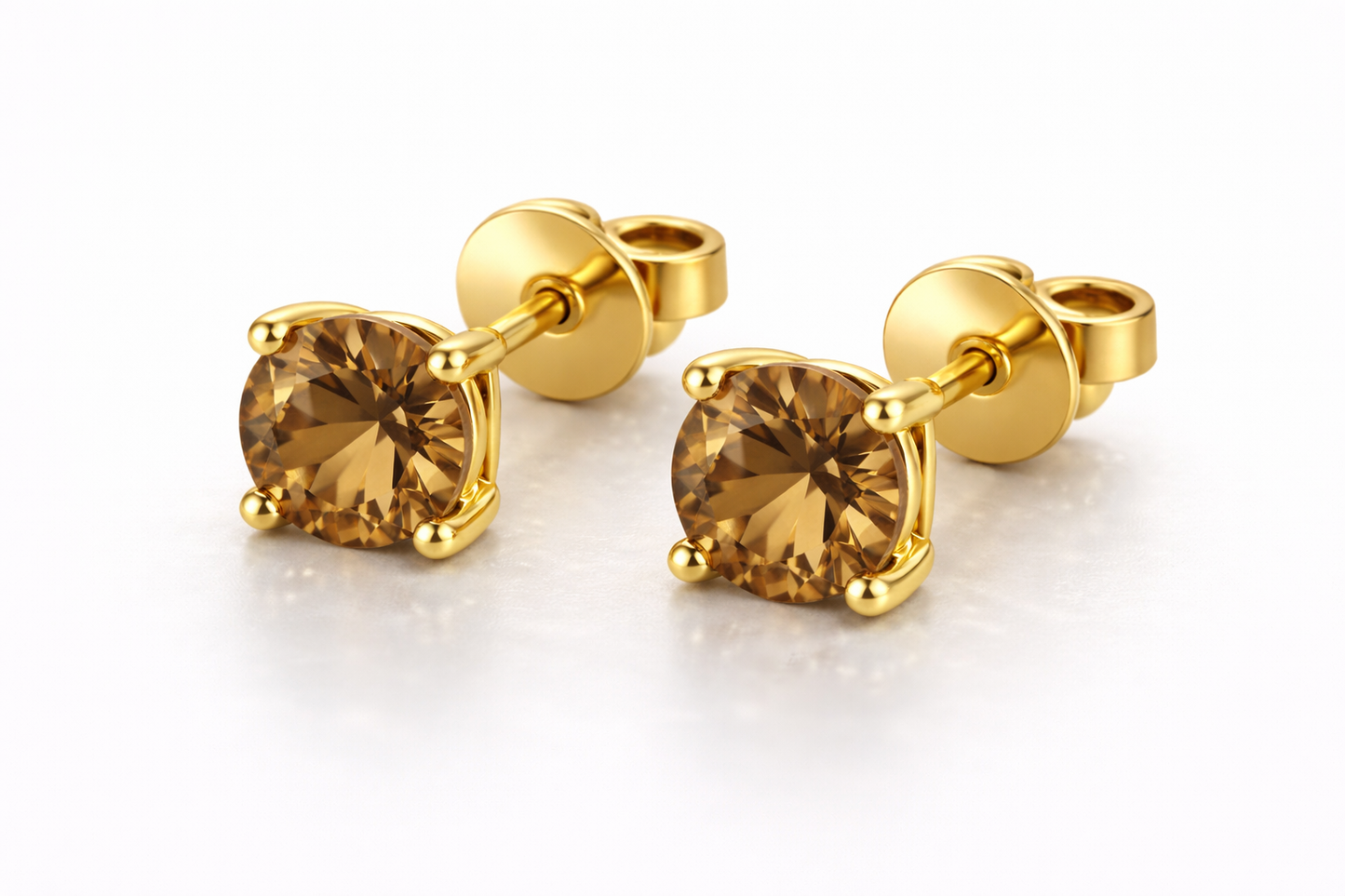Сережки-гвоздики AÏNE Wine Topaz із жовтого золота
