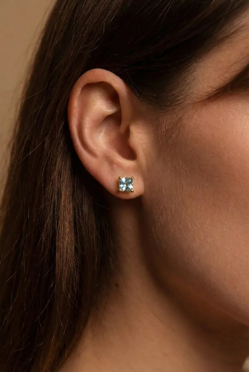 AÏNE Blue Topaz Studs in Yellow Gold